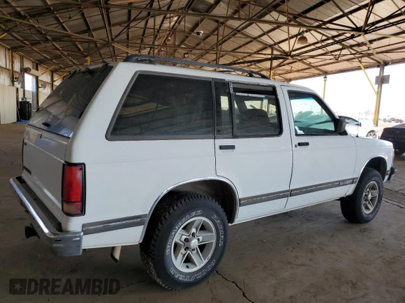 1994 Chevrolet Blazer z VIN 1GNCS13W3R0157183, wystawiony jako Copart lot #52246055 z przebiegiem 91 826 mil mil oraz Czysty tytuł • Clean title. Historia ofert i sprzedaży dostępna na DreamBid. Obrazek 3.