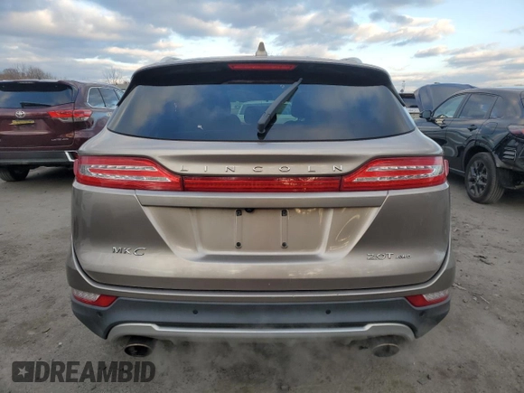 2018 Lincoln MKC Select with VIN 5LMCJ2D99JUL21181, listed as a Copart auction lot 82827134 with 63,667 mi miles and Salvage title. Bid and sale history available at DreamBid. Image 6.