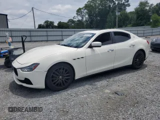 2014 Maserati Ghibli with VIN ZAM57XSA3E1084330, listed as a Copart auction lot 64568195 with 77,617 mi miles and Clean title. Bid and sale history available at DreamBid. Image 1.
