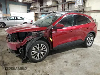 2020 Ford Escape Titanium Hybrid with VIN 1FMCU9DZ2LUA96527, listed as a Copart auction lot 57313975 with 114,142 mi miles and Salvage title. Bid and sale history available at DreamBid. Image 1.