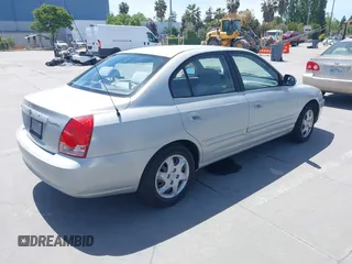 2004 Hyundai Elantra GLS z VIN KMHDN46D74U781436, wystawiony jako IAAI lot #42260519 z przebiegiem 132 943 mil mil oraz . Historia ofert i sprzedaży dostępna na DreamBid. Obrazek 4.