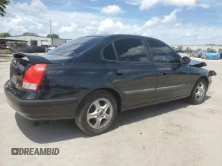 2003 Hyundai Elantra GLS with VIN KMHDN45D03U500898, listed as a Copart auction lot 61473825 with 127,252 mi miles and Salvage title. Bid and sale history available at DreamBid. Image 3.