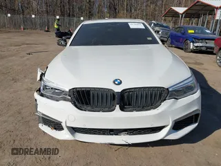 2018 BMW 5 Series M550i xDrive with VIN WBAJB9C53JB036097, listed as a IAAI auction lot 41743031 with 70,164 mi miles and . Bid and sale history available at carsss.com. Image 13.