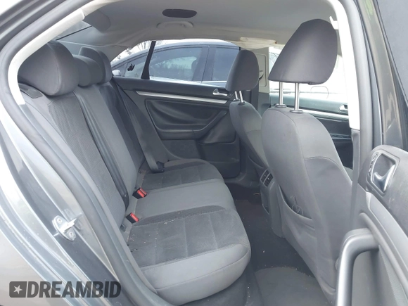 2009 Volkswagen Jetta S with VIN 3VWJZ71K49M053603, listed as a IAAI auction lot 41785816 with 100,065 mi miles and . Bid and sale history available at DreamBid. Image 8.