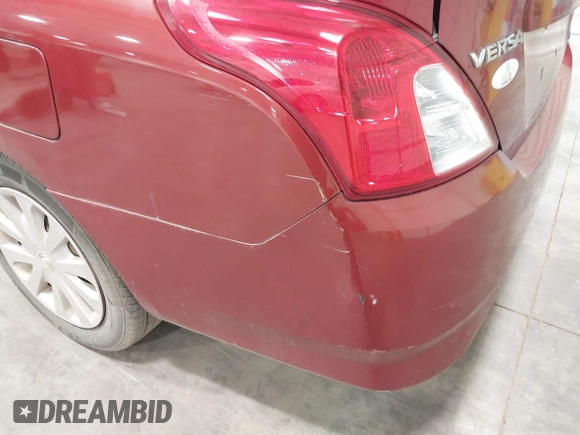 2016 Nissan Versa S z VIN 3N1CN7AP4GL804482, wystawiony jako IAAI lot #42145411 z przebiegiem 140 780 mil mil oraz . Historia ofert i sprzedaży dostępna na DreamBid. Obrazek 12.