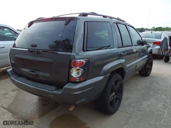 2004 Jeep Grand Cherokee Laredo with VIN 1J4GX48S14C218695, listed as a IAAI auction lot 41933611 with 158,290 mi miles. Bid and sale history available at carsss.com. Image 4.