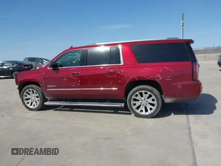 2020 GMC Yukon XL Denali with VIN 1GKS1HKJ3LR238701, listed as a IAAI auction lot 41724274 with 107,323 mi miles and . Bid and sale history available at DreamBid. Image 14.