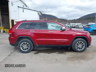 2015 Jeep Grand Cherokee Limited with VIN 1C4RJFBG3FC159426, listed as a IAAI auction lot 41848001 with 135,311 mi miles. Bid and sale history available at carsss.com. Image 13.