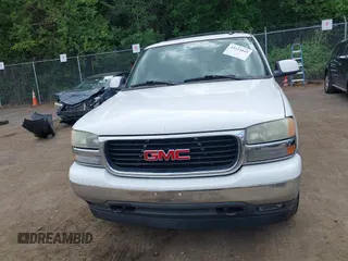 2005 GMC Yukon SLT z VIN 1GKEC13T75R114660, wystawiony jako IAAI lot #42223845 z przebiegiem 199 064 mil mil oraz . Historia ofert i sprzedaży dostępna na DreamBid. Obrazek 12.