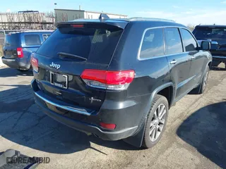 2018 Jeep Grand Cherokee Limited with VIN 1C4RJFBG0JC261355, listed as a IAAI auction lot 40790316 with 76,244 mi miles. Bid and sale history available at carsss.com. Image 4.
