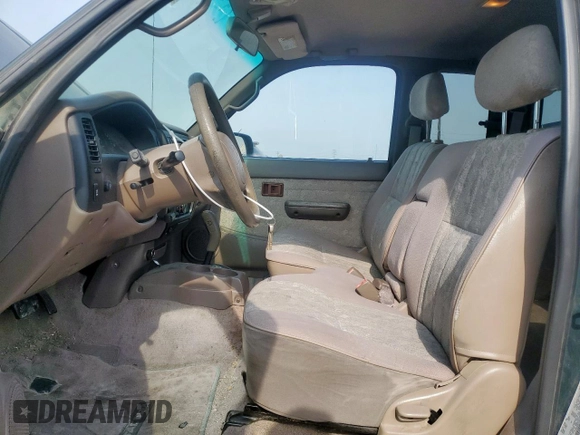 2000 Toyota Tacoma PreRunner with VIN 4TASM92N7YZ598102, listed as a Copart auction lot 57183275 with 437,896 mi miles and Clean title. Bid and sale history available at DreamBid. Image 7.