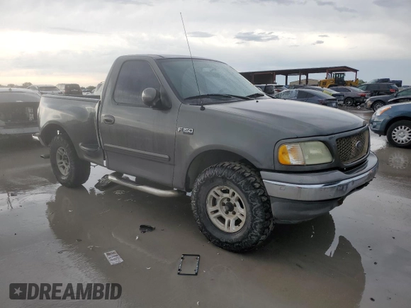 2003 Ford F-150 XL z VIN 1FTRF17263NA29013, wystawiony jako Copart lot #55668355 z przebiegiem 202 416 mil mil oraz Szkoda całkowita • Salvage title. Historia ofert i sprzedaży dostępna na DreamBid. Obrazek 4.