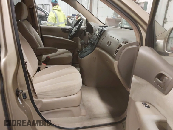 2007 Kia Sedona EX with VIN KNDMB233576160010, listed as a IAAI auction lot 41666497 with 206,834 mi miles. Bid and sale history available at carsss.com. Image 5.
