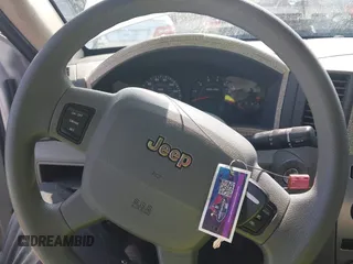 2006 Jeep Grand Cherokee Laredo with VIN 1J4GS48K56C260532, listed as a IAAI auction lot 42607110 with 153,110 mi miles and . Bid and sale history available at DreamBid. Image 11.
