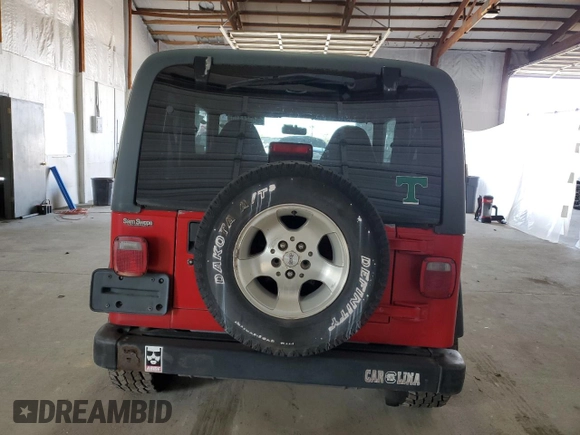 2000 Jeep Wrangler Sport with VIN 1J4FA49S9YP751596, listed as a Copart auction lot 52527315 with 132,514 mi miles and Clean Title. Bid and sale history available at carsss.com. Image 6.