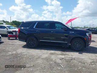 2021 GMC Yukon Denali with VIN 1GKS2DKL7MR471280, listed as a IAAI auction lot 40189766 with 126,591 mi miles. Bid and sale history available at carsss.com. Image 13.