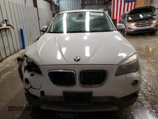 2014 BMW X1 xDrive28i with VIN WBAVL1C57EVY14339, listed as a Copart auction lot 42933495 with 121,026 mi miles and Salvage Title. Bid and sale history available at carsss.com. Image 5.
