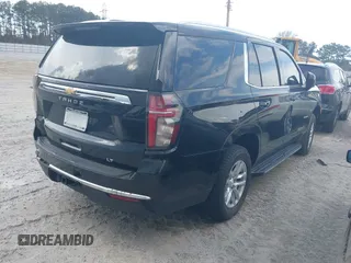 2021 Chevrolet Tahoe LT z VIN 1GNSCNKD8MR248213, wystawiony jako IAAI lot #41173322 z przebiegiem 121 393 mil mil oraz . Historia ofert i sprzedaży dostępna na DreamBid. Obrazek 4.