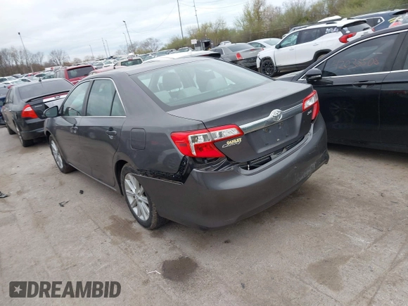 2014 Toyota Camry L with VIN 4T4BF1FK6ER364253, listed as a IAAI auction lot 42011773 with 87,051 mi miles. Bid and sale history available at carsss.com. Image 3.