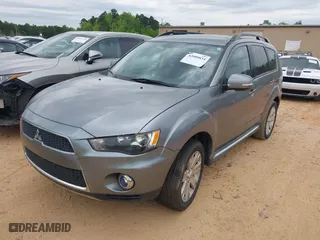 2013 Mitsubishi Outlander SE with VIN JA4JT3AW6DU020939, listed as a IAAI auction lot 42009834 with 199,402 mi miles. Bid and sale history available at carsss.com. Image 2.
