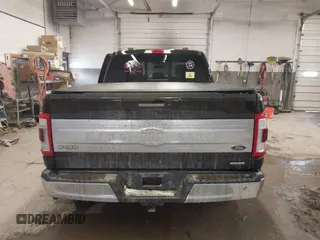 2021 Ford F-150 XL with VIN 1FTFW1E8XMFA47553, listed as a IAAI auction lot 41496255 with 83,711 mi miles. Bid and sale history available at carsss.com. Image 16.