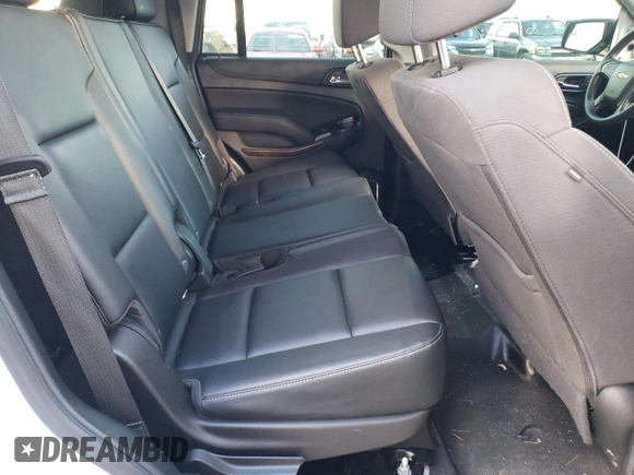 2020 Chevrolet Tahoe Commercial z VIN 1GNSKDEC8LR240143, wystawiony jako Copart lot #79911654 z przebiegiem 99 084 mil mil oraz Szkoda całkowita • Salvage title. Historia ofert i sprzedaży dostępna na DreamBid. Obrazek 11.