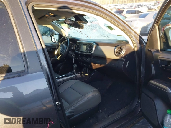 2018 Toyota Tacoma SR with VIN 5TFCZ5AN7JX154112, listed as a IAAI auction lot 41394058 with 158,045 mi miles. Bid and sale history available at carsss.com. Image 5.