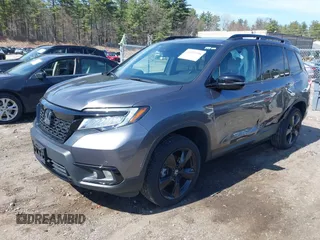 2021 Honda Passport Elite with VIN 5FNYF8H08MB011467, listed as a IAAI auction lot 41929708 with 34,106 mi miles. Bid and sale history available at carsss.com. Image 17.