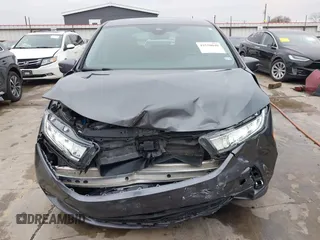 2021 Honda Odyssey Touring with VIN 5FNRL6H86MB021504, listed as a IAAI auction lot 41550040 with 55,068 mi miles. Bid and sale history available at carsss.com. Image 13.