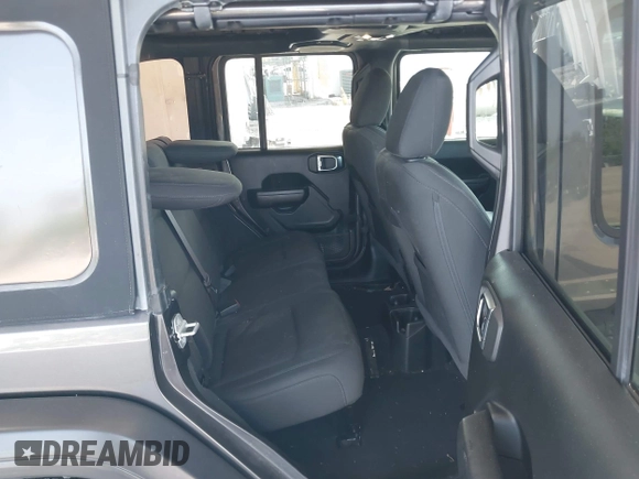 2020 Jeep Wrangler Unlimited Sport S with VIN 1C4HJXDN9LW167442, listed as a IAAI auction lot 42308617 with 59,335 mi miles and . Bid and sale history available at DreamBid. Image 8.