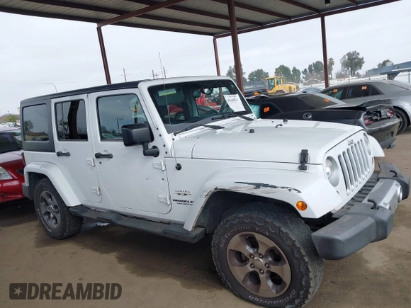 2017 Jeep Wrangler Unlimited Sahara with VIN 1C4HJWEG0HL595144, listed as a IAAI auction lot 41644511 with 143,512 mi miles. Bid and sale history available at carsss.com. Image 14.