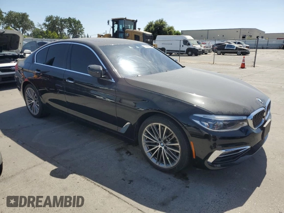 2017 BMW 5 Series 540i xDrive with VIN WBAJE7C36HWA03708, listed as a Copart auction lot 61983685 with 122,082 mi miles and Clean title. Bid and sale history available at DreamBid. Image 4.