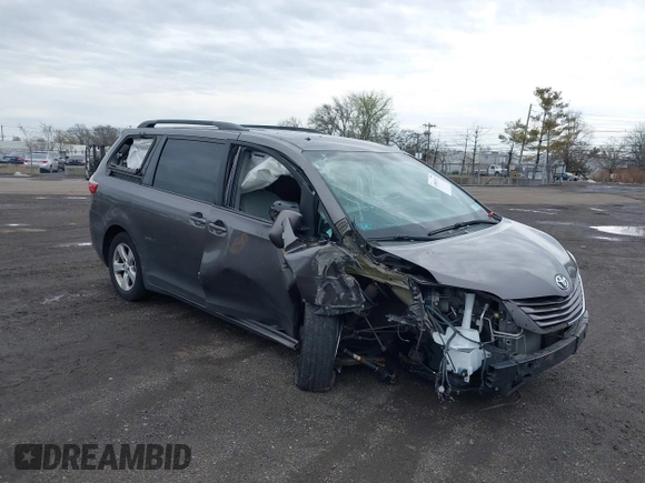 2015 Toyota Sienna LE AAS with VIN 5TDKK3DC1FS615090, listed as a IAAI auction lot 41965112 with 116,745 mi miles. Bid and sale history available at carsss.com. Image 6.