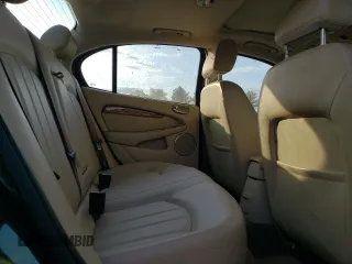 2004 Jaguar X-Type z VIN SAJEA51C04WD65097, wystawiony jako Copart lot #53825295 z przebiegiem 58 270 mil mil oraz Szkoda całkowita • Salvage title. Historia ofert i sprzedaży dostępna na DreamBid. Obrazek 10.