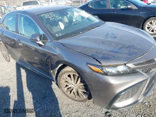 2021 Toyota Camry SE Nightshade with VIN 4T1G11AK2MU485544, listed as a IAAI auction lot 41000022 with 57,374 mi miles. Bid and sale history available at carsss.com. Image 1.