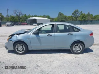 2009 Ford Focus SE with VIN 1FAHP35N19W232918, listed as a IAAI auction lot 42076066 with 165,953 mi miles. Bid and sale history available at carsss.com. Image 14.