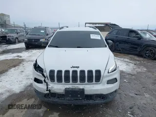 2016 Jeep Cherokee Altitude with VIN 1C4PJLAB4GW376723, listed as a IAAI auction lot 41593248 with 96,940 mi miles and . Bid and sale history available at DreamBid. Image 12.