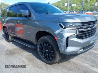2023 Chevrolet Tahoe LT z VIN 1GNSKNKD3PR233173, wystawiony jako IAAI lot #42298494 z przebiegiem 31 222 mil mil oraz . Historia ofert i sprzedaży dostępna na DreamBid. Obrazek 1.