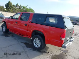2001 Dodge Dakota Sport with VIN 1B7GG2AN51S148828, listed as a IAAI auction lot 42095653 with 232,995 mi miles and . Bid and sale history available at carsss.com. Image 3.