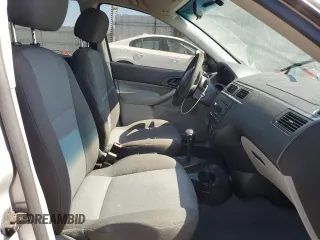 2007 Ford Focus S z VIN 1FAFP34N97W264411, wystawiony jako Copart lot #53251655 z przebiegiem 159 516 mil mil oraz Szkody całkowita. Historia ofert i sprzedaży dostępna na DreamBid. Obrazek 7.