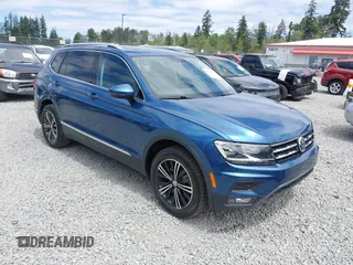 2018 Volkswagen Tiguan SEL z VIN 3VV2B7AX0JM073361, wystawiony jako IAAI lot #42521374 z przebiegiem 67 916 mil mil oraz . Historia ofert i sprzedaży dostępna na DreamBid. Obrazek 1.