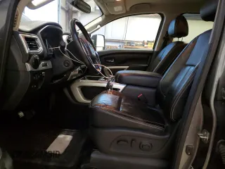 2016 Nissan Titan XD Platinum Reserve with VIN 1N6BA1F44GN503112, listed as a Copart auction lot 81138394 with 143,321 mi miles and Salvage Title. Bid and sale history available at carsss.com. Image 7.