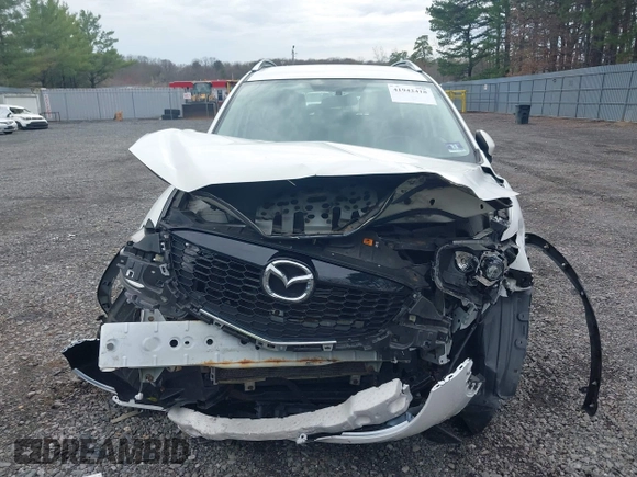 2014 Mazda CX-5 Sport with VIN JM3KE4BE3E0300849, listed as a IAAI auction lot 41942418 with 144,310 mi miles. Bid and sale history available at carsss.com. Image 12.