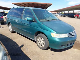 2002 Honda Odyssey EX z VIN 5FNRL18662B010713, wystawiony jako IAAI lot #42073870 z przebiegiem 326 718 mil mil oraz . Historia ofert i sprzedaży dostępna na DreamBid. Obrazek 1.
