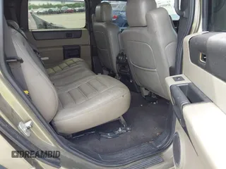 2006 Hummer H2 with VIN 5GRGN23U56H102574, listed as a IAAI auction lot 41955539 with 202,102 mi miles. Bid and sale history available at carsss.com. Image 8.