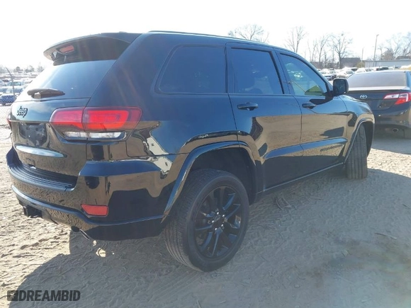 2021 Jeep Grand Cherokee Laredo X with VIN 1C4RJFAG4MC529961, listed as a IAAI auction lot 41651822 with 32,601 mi miles. Bid and sale history available at carsss.com. Image 4.