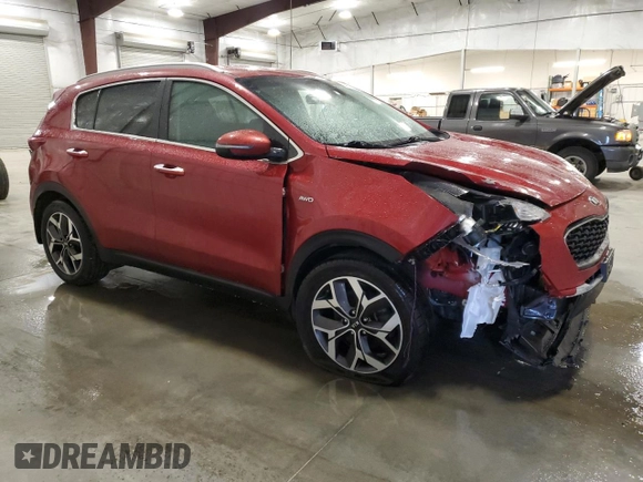 2020 Kia Sportage EX with VIN KNDPNCAC2L7703007, listed as a Copart auction lot 54276035 with 65,269 mi miles and Salvage title. Bid and sale history available at DreamBid. Image 4.