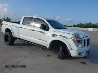 2018 Nissan Titan Platinum Reserve with VIN 1N6BA1F4XJN520892, listed as a IAAI auction lot 42553763 with 114,522 mi miles and . Bid and sale history available at DreamBid. Image 1.