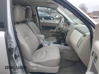 2009 Mercury Mariner Premier with VIN 4M2CU97719KJ15260, listed as a IAAI auction lot 41500367 with 104,063 mi miles. Bid and sale history available at carsss.com. Image 5.