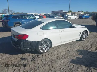 2014 BMW 4 Series 428i with VIN WBA3N3C53EF712057, listed as a IAAI auction lot 41868781 with 133,834 mi miles and . Bid and sale history available at DreamBid. Image 4.